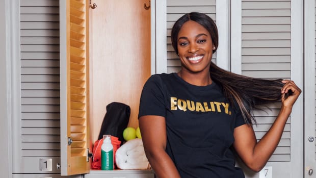 sloane_standing_next_to_a_locker.jpg